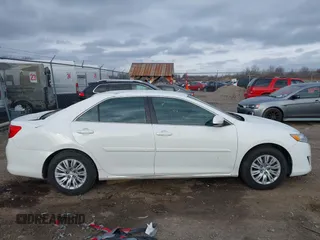 2014 Toyota Camry L with VIN 4T4BF1FKXER374901, listed as a IAAI auction lot 41861839 with 130,990 mi miles and . Bid and sale history available at DreamBid. Image 13.