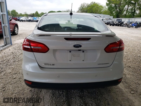 2018 Ford Focus Titanium с VIN 1FADP3J23JL246545, выставлен на аукционе Copart как лот 54838735 с пробегом 85 507 миль миль и Списание • Salvage title. История ставок и продаж доступна на DreamBid. Изображение 6.