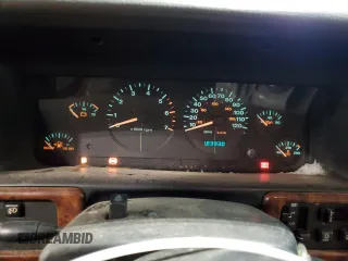1997 Jeep Grand Cherokee Limited with VIN 1J4GZ78Y4VC589688, listed as a Copart auction lot 84673974 with 183,930 mi miles and Salvage Title. Bid and sale history available at carsss.com. Image 9.