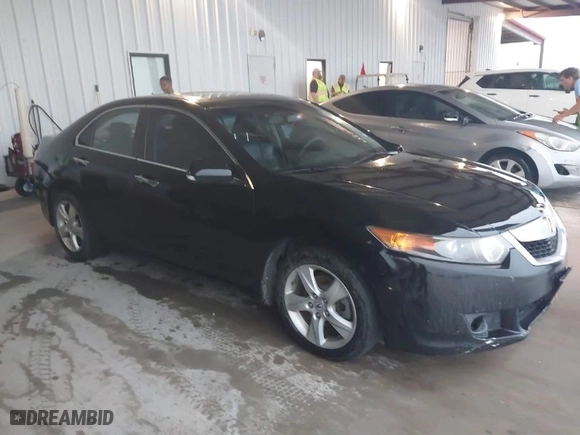 2009 Acura TSX with VIN JH4CU26629C004182, listed as a IAAI auction lot 42086811 with 206,526 mi miles. Bid and sale history available at carsss.com. Image 1.