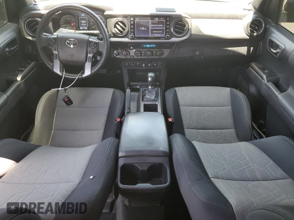 2022 Toyota Tacoma SR with VIN 3TMCZ5AN5NM482575, listed as a Copart auction lot 61498025 with 49,046 mi miles and Salvage title. Bid and sale history available at DreamBid. Image 8.