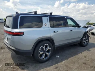 2024 Rivian R1S Adventure with VIN 7PDSGBBA1RN041672, listed as a Copart auction lot 61924974 with Not Provided miles and Salvage Title. Bid and sale history available at carsss.com. Image 3.