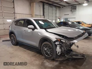 2017 Mazda CX-5 Sport with VIN JM3KFBBL1H0116157, listed as a IAAI auction lot 41584679 with 92,325 mi miles. Bid and sale history available at carsss.com. Image 1.