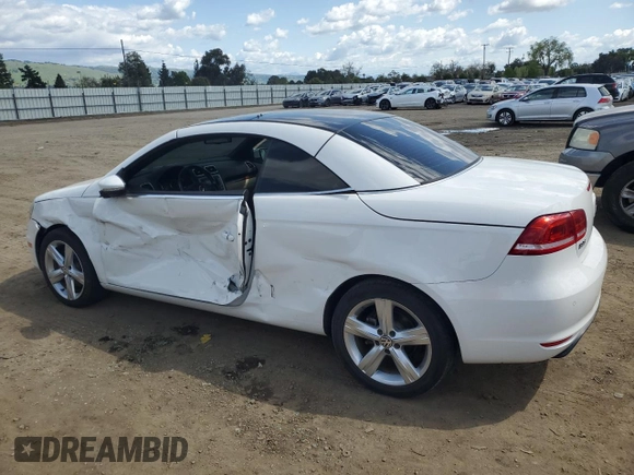 2012 Volkswagen Eos Lux with VIN WVWFW7AH8CV018727, listed as a Copart auction lot 51332135 with 104,636 mi miles and Salvage Title. Bid and sale history available at DreamBid. Image 2.