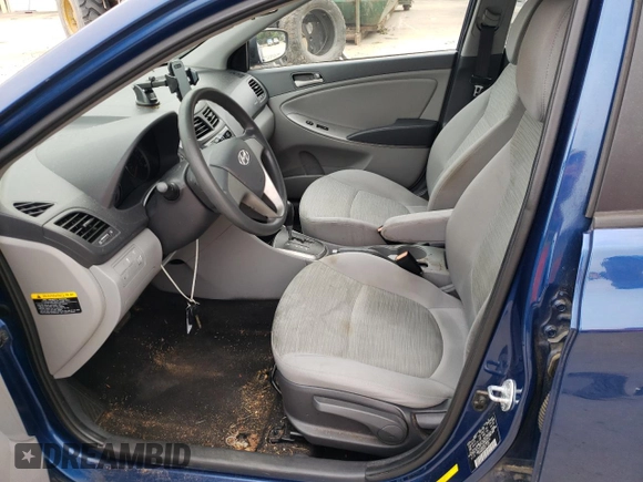 2015 Hyundai Accent GLS with VIN KMHCT4AE4FU886410, listed as a Copart auction lot 62561083 with 124,306 mi miles. Bid and sale history available at carsss.com. Image 7.