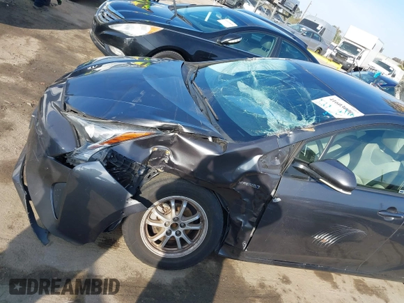 2017 Toyota Prius Two with VIN JTDKARFU3H3047912, listed as a IAAI auction lot 41603006 with 107,827 mi miles. Bid and sale history available at carsss.com. Image 6.