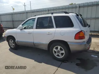 2004 Hyundai Santa Fe GLS with VIN KM8SC73E54U813053, listed as a Copart auction lot 70923004 with 143,490 mi miles and Salvage Title. Bid and sale history available at carsss.com. Image 2.