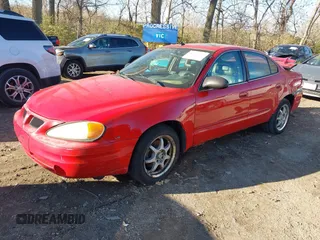 2004 Pontiac Grand Am SE2 with VIN 1G2NG52E84M672446, listed as a IAAI auction lot 40834541 with 209,231 mi miles. Bid and sale history available at carsss.com. Image 17.