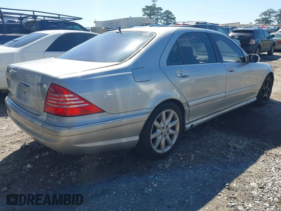 2003 Mercedes-Benz S-Class 5.0L with VIN WDBNG84J03A377024, listed as a IAAI auction lot 41749903 with 114,096 mi miles. Bid and sale history available at carsss.com. Image 4.