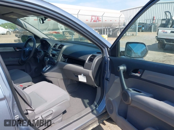 2010 Honda CR-V LX with VIN 3CZRE3H39AG701619, listed as a IAAI auction lot 41986031 with 107,200 mi miles and . Bid and sale history available at DreamBid. Image 5.