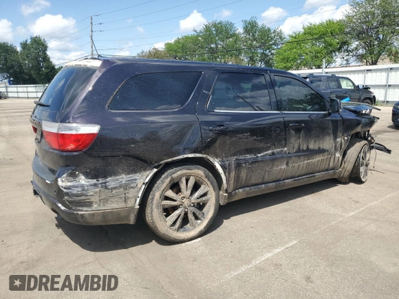 2013 Dodge Durango R/T with VIN 1C4SDJCT1DC672338, listed as a Copart auction lot 61544445 with 203,404 mi miles and Salvage title. Bid and sale history available at DreamBid. Image 3.