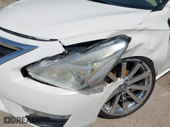 2014 Nissan Altima S with VIN 1N4AL3AP5EN335473, listed as a IAAI auction lot 41952678 with 156,474 mi miles and . Bid and sale history available at DreamBid. Image 12.