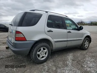 1999 Mercedes-Benz M 320/430/500 with VIN 4JGAB54E9XA127797, listed as a Copart auction lot 51408235 with 243,566 mi miles and Salvage title. Bid and sale history available at DreamBid. Image 3.