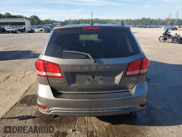 2013 Dodge Journey SXT with VIN 3C4PDCBG0DT522408, listed as a Copart auction lot 62699195 with 130,665 mi miles and Salvage title. Bid and sale history available at DreamBid. Image 6.