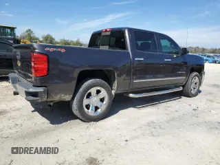2014 Chevrolet Silverado 1500 LTZ with VIN 3GCUKSEC5EG211708, listed as a Copart auction lot 46094635 with 112,980 mi miles and Salvage Title. Bid and sale history available at DreamBid. Image 3.