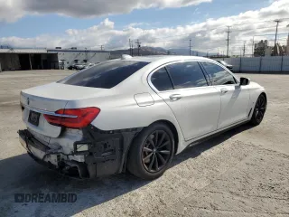 2018 BMW 7 Series 740e xDrive iPerformance with VIN WBA7J2C51JG938111, listed as a Copart auction lot 73361933 with 104,641 mi miles. Bid and sale history available at carsss.com. Image 3.