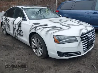 2012 Audi A8 z VIN WAUAVAFD9CN025571, wystawiony jako IAAI lot #41919518 z przebiegiem 134 341 mil mil oraz . Historia ofert i sprzedaży dostępna na DreamBid. Obrazek 1.
