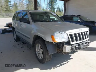 2008 Jeep Grand Cherokee Laredo with VIN 1J8GR48K18C222454, listed as a IAAI auction lot 42047541 with 180,145 mi miles. Bid and sale history available at carsss.com. Image 1.