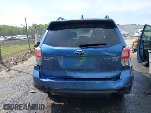 2017 Subaru Forester Touring with VIN JF2SJGWC5HH567870, listed as a IAAI auction lot 42007542 with 76,560 mi miles. Bid and sale history available at carsss.com. Image 16.