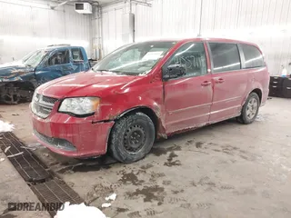 2012 Dodge Grand Caravan SE with VIN 2C4RDGBG7CR288009, listed as a IAAI auction lot 41557118 with 223,287 mi miles. Bid and sale history available at carsss.com. Image 2.