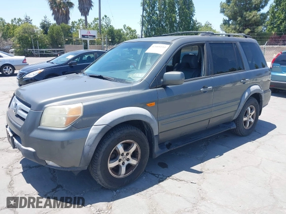 2007 Honda Pilot EX-L with VIN 5FNYF18587B015655, listed as a IAAI auction lot 42485193 with 293,684 mi miles and . Bid and sale history available at DreamBid. Image 2.