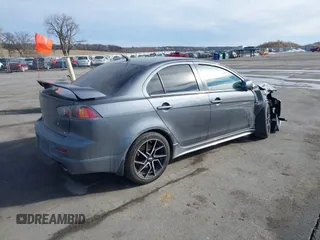 2009 Mitsubishi Lancer with VIN JA3AV66V19U035047, listed as a IAAI auction lot 41591612 with 113,119 mi miles and . Bid and sale history available at DreamBid. Image 13.