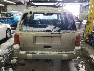 1997 Jeep Grand Cherokee Limited with VIN 1J4GZ78Y1VC706353, listed as a Copart auction lot 41437085 with 163,675 mi miles and Salvage Title. Bid and sale history available at carsss.com. Image 6.
