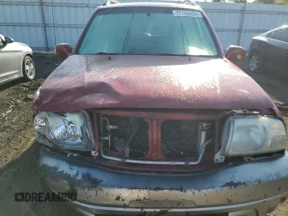 2002 Suzuki Grand Vitara JLX z VIN JS3TD62VX24151115, wystawiony jako Copart lot #71155924 z przebiegiem 264 639 mil mil oraz Szkoda całkowita • Salvage title. Historia ofert i sprzedaży dostępna na DreamBid. Obrazek 11.