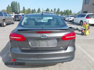 2015 Ford Focus SE with VIN 1FADP3F25FL348929, listed as a IAAI auction lot 42275725 with 99,668 mi miles and . Bid and sale history available at DreamBid. Image 17.