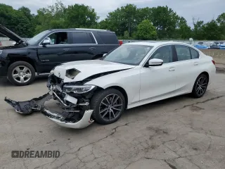 2019 BMW 3 Series 330i xDrive with VIN WBA5R7C52KAJ82287, listed as a Copart auction lot 62350575 with 71,803 mi miles and Salvage title. Bid and sale history available at DreamBid. Image 1.