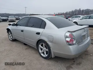 2005 Nissan Altima SE with VIN 1N4BL11E65C133566, listed as a IAAI auction lot 41792300 with 169,733 mi miles. Bid and sale history available at carsss.com. Image 3.
