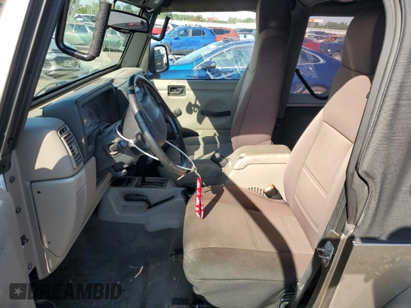 2004 Jeep Wrangler Sahara with VIN 1J4FA59S14P755450, listed as a Copart auction lot 58558005 with 194,044 mi miles and Salvage title. Bid and sale history available at DreamBid. Image 7.