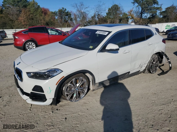 2021 BMW X2 xDrive28i with VIN WBXYJ1C00M5S24107, listed as a Copart auction lot 81824504 with 29,376 mi miles and Salvage Title. Bid and sale history available at carsss.com. Image 1.