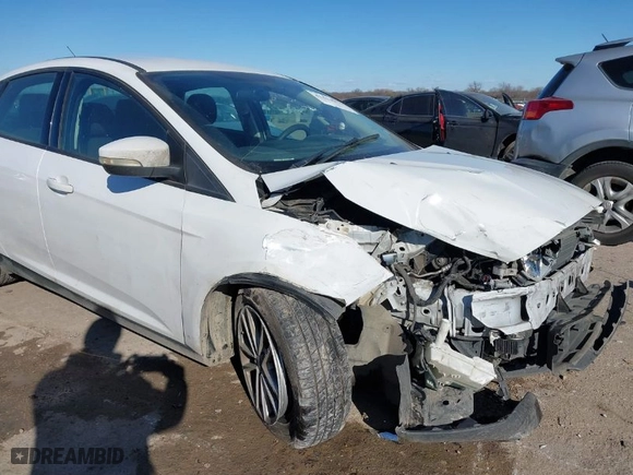 2016 Ford Focus SE with VIN 1FADP3F25GL373234, listed as a IAAI auction lot 41414976 with 150,243 mi miles. Bid and sale history available at carsss.com. Image 6.