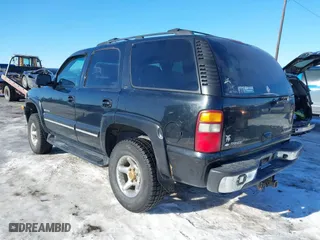 2001 Chevrolet Tahoe LS with VIN 1GNEK13T01J116989, listed as a IAAI auction lot 41871390 with 265,541 mi miles. Bid and sale history available at carsss.com. Image 3.