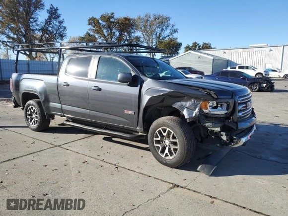2015 GMC Canyon 2WD SLE with VIN 1GTG5BE38F1240947, listed as a Copart auction lot 82707204 with 63,049 mi miles and Salvage Title. Bid and sale history available at carsss.com. Image 4.