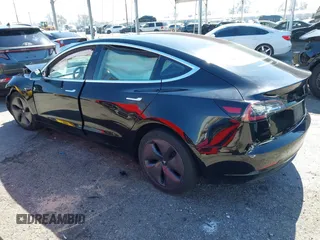 2018 Tesla Model 3 Long Range Battery with VIN 5YJ3E1EB9JF183920, listed as a IAAI auction lot 41657742 with 107,358 mi miles and . Bid and sale history available at DreamBid. Image 3.