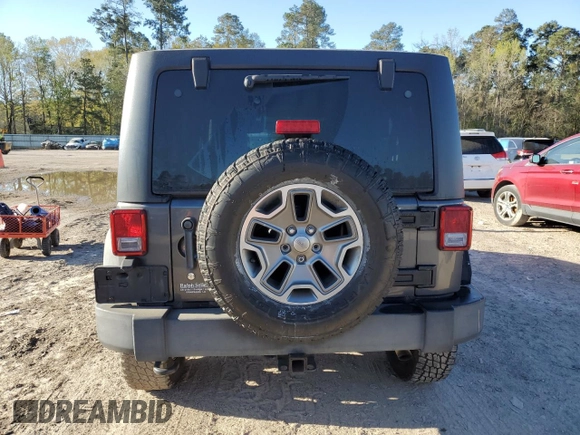 2014 Jeep Wrangler Unlimited Rubicon with VIN 1C4BJWFG4EL256824, listed as a Copart auction lot 49473815 with 117,264 mi miles and Salvage Title. Bid and sale history available at carsss.com. Image 6.