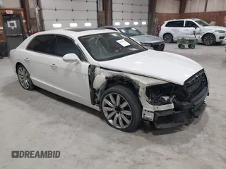 2015 Bentley Flying Spur V8 with VIN SCBET9ZA9F8049207, listed as a IAAI auction lot 41959074 with 85,839 mi miles and . Bid and sale history available at DreamBid. Image 1.