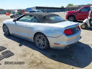 2016 Ford Mustang EcoBoost Premium with VIN 1FATP8UHXG5243292, listed as a IAAI auction lot 42315552 with 106,753 mi miles and . Bid and sale history available at DreamBid. Image 3.
