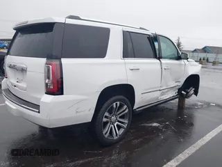 2018 GMC Yukon Denali with VIN 1GKS2CKJ8JR274087, listed as a IAAI auction lot 41097872 with 76,828 mi miles. Bid and sale history available at carsss.com. Image 4.