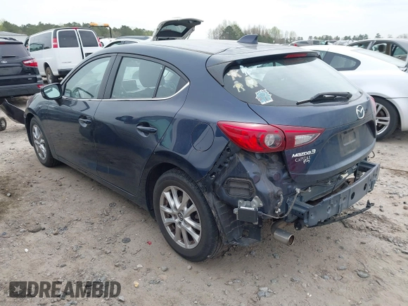 2014 Mazda 3 i Grand Touring with VIN JM1BM1M77E1133477, listed as a IAAI auction lot 41861051 with 124,377 mi miles and . Bid and sale history available at DreamBid. Image 3.