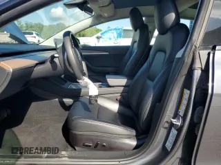 2023 Tesla Model 3 with VIN 5YJ3E1EA7PF456613, listed as a Copart auction lot 56940255 with 35,920 mi miles and Non repairable. Bid and sale history available at DreamBid. Image 7.