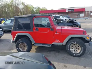 2003 Jeep Wrangler Sport with VIN 1J4FA49S13P320159, listed as a IAAI auction lot 41935699 with 212,355 mi miles. Bid and sale history available at carsss.com. Image 13.