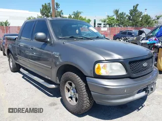 2003 Ford F-150 XLT with VIN 1FTRW07L53KD01569, listed as a IAAI auction lot 42317634 with Not provided miles and . Bid and sale history available at DreamBid. Image 1.