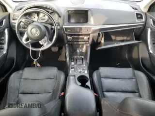 2016 Mazda CX-5 Grand Touring with VIN JM3KE4DY0G0876540, listed as a Copart auction lot 42132815 with 110,158 mi miles and Salvage Title. Bid and sale history available at DreamBid. Image 8.