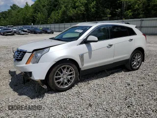2014 Cadillac SRX Premium Collection with VIN 3GYFNDE3XES677153, listed as a Copart auction lot 60099755 with 104,876 mi miles and Salvage title. Bid and sale history available at DreamBid. Image 1.