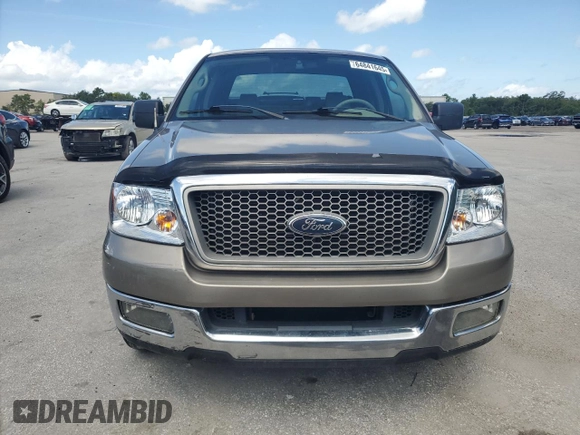 2005 Ford F-150 XLT with VIN 1FTRX12585FA42177, listed as a Copart auction lot 64841645 with 153,779 mi miles and Salvage title. Bid and sale history available at DreamBid. Image 5.
