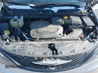 2021 Chrysler Voyager LXI with VIN 2C4RC1DG7MR566518, listed as a IAAI auction lot 41624729 with 93,489 mi miles. Bid and sale history available at carsss.com. Image 10.
