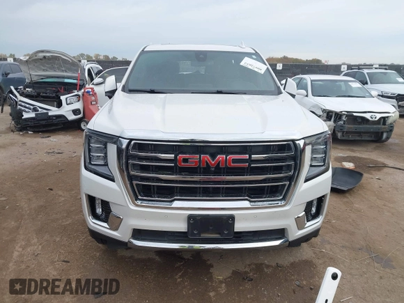 2021 GMC Yukon SLT with VIN 1GKS1BKD1MR489922, listed as a IAAI auction lot 40972652 with 77,791 mi miles. Bid and sale history available at carsss.com. Image 12.